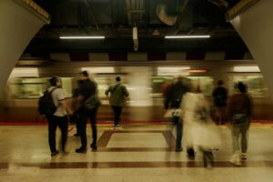 Blurred motion capture of busy commuters at an İstanbul subway station.
